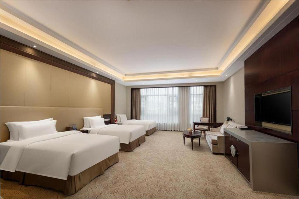 Linyi Blue Horizon International Hotel Yi He Buitenkant foto